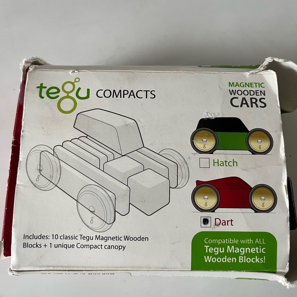 Kids tegu wooden magnetic blocks to make Dart car.  Includes 18 magnetic blocks.